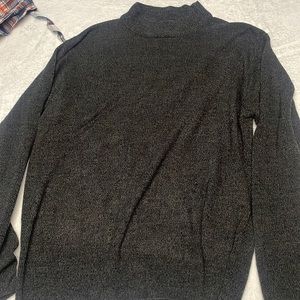 Black turtle neck sweater